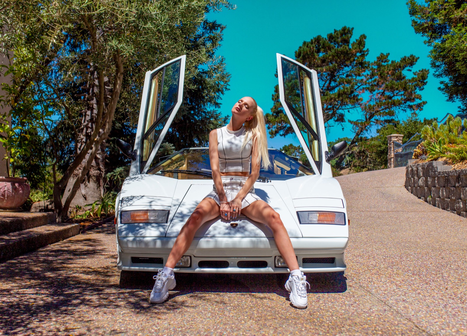 Editorial campaign photographed with a white Lamborghini