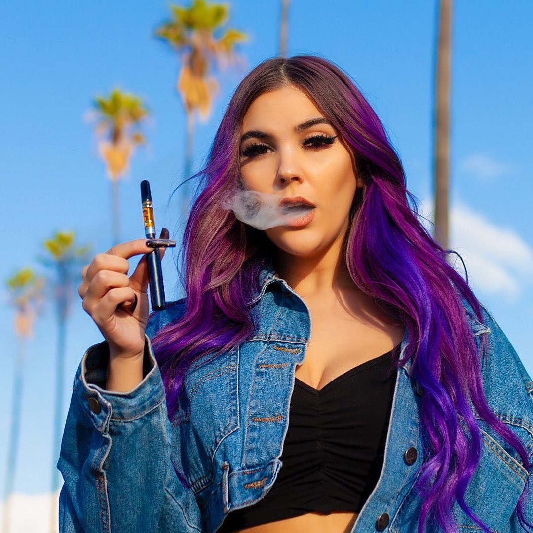 Campaign portrait with vivid purple hair
